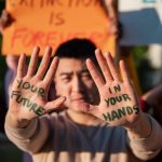 https://www.freepik.com/free-photo/man-with-writing-palms-close-up_14370911.htm